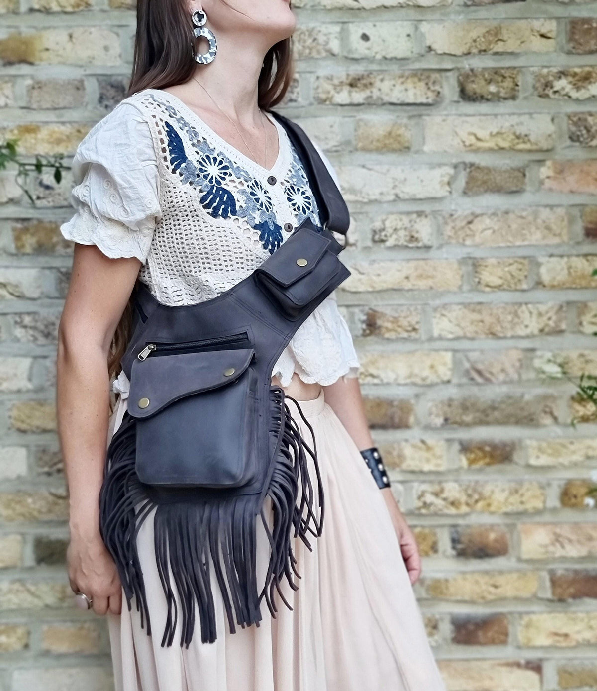 Boho chic women's leather bum bag with fringe tassel - hands-free fashion