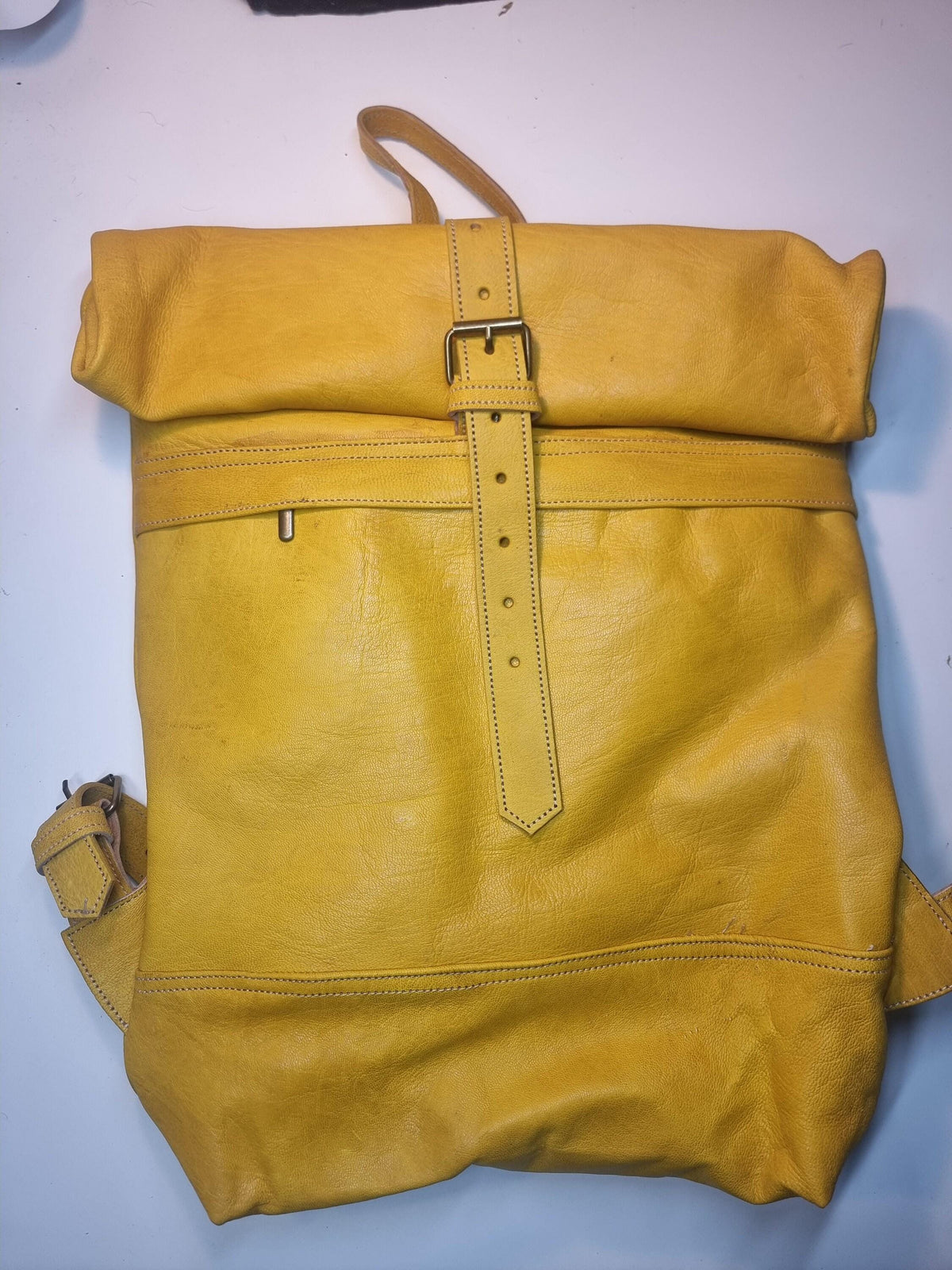 Large roll top leather backpack for women in minimalist design - practical versatile travel rucksack