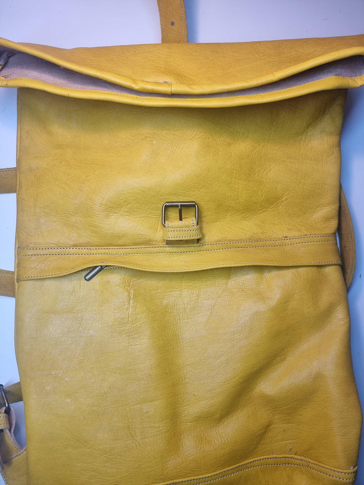 Large roll top leather backpack for women in minimalist design - practical versatile travel rucksack