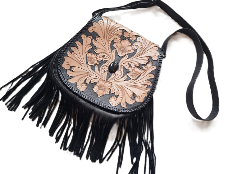 Handcrafted floral tooled leather bag with fringe - boho chic style