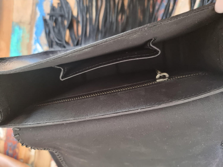 Handcrafted floral tooled leather bag with fringe - boho chic style