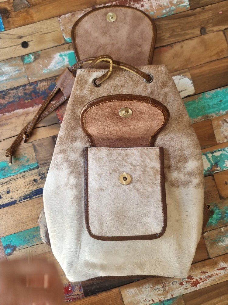 Cowhide Leather Backpack – Small Western Rucksack with Cow Print, Fringe & Conchos