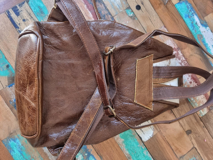 Cowhide Leather Backpack – Small Western Rucksack with Cow Print, Fringe & Conchos