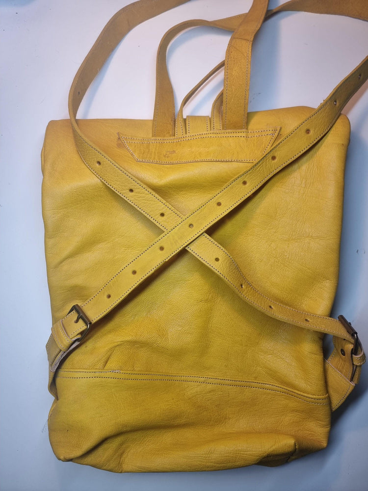 Large roll top leather backpack for women in minimalist design - practical versatile travel rucksack