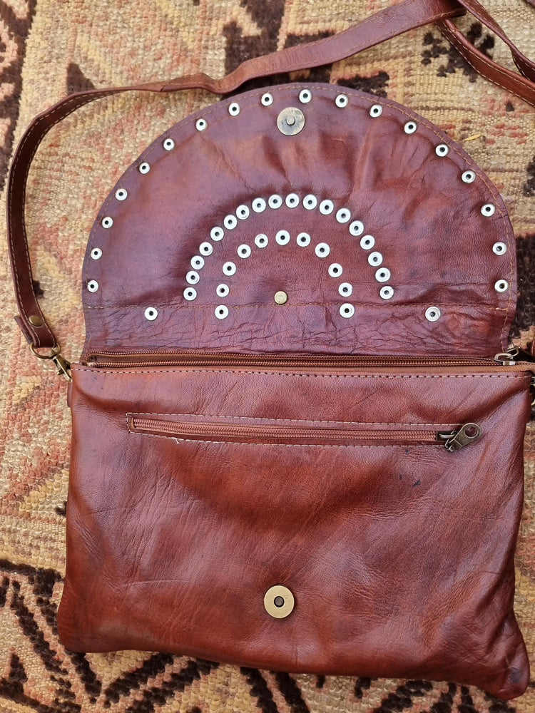 Studded Leather Envelope Clutch: Moroccan Crossbody Bag with Rising Sun