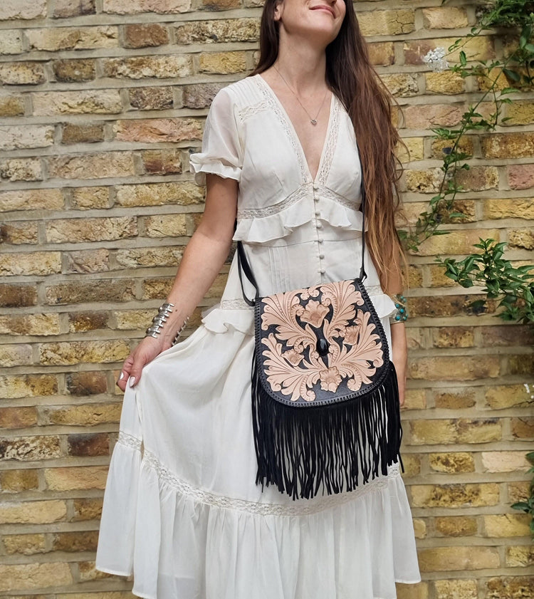 Handcrafted floral tooled leather bag with fringe - boho chic style