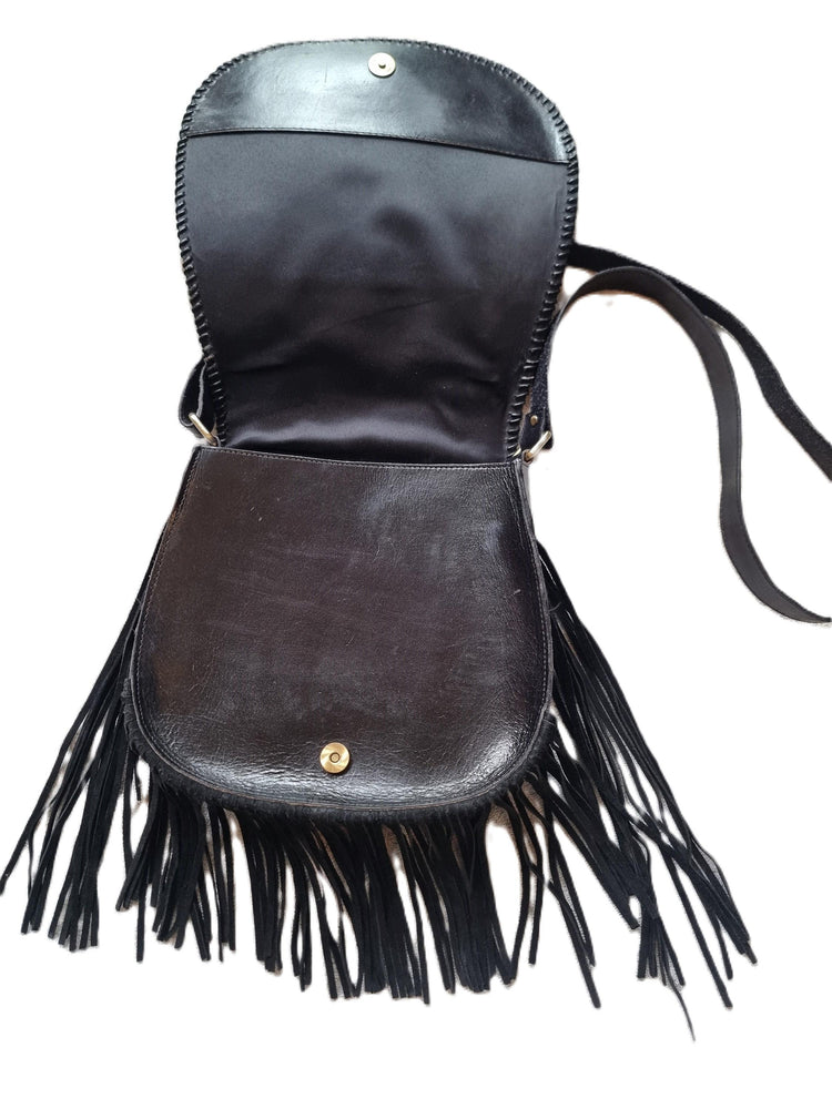 Handcrafted floral tooled leather bag with fringe - boho chic style
