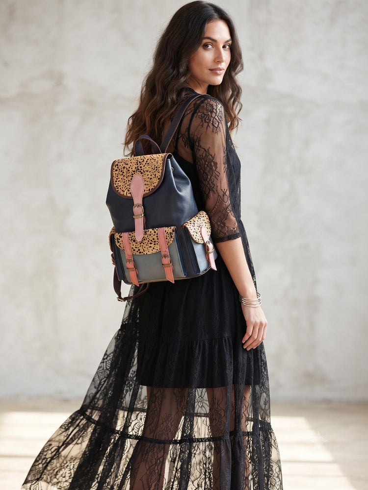 Patchwork Leather Cowhide Backpack Purse: Women's Artisan Rucksack with Hair-On Hide Pockets - Multicoloured Leather Bag