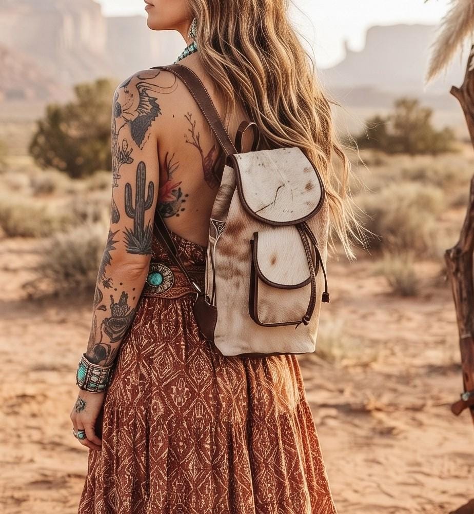 Cowhide Leather Backpack – Small Western Rucksack with Cow Print, Fringe & Conchos